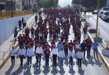 ENCABEZA LAMARQUE CANO DESFILE POR EL DÍA DEL TRABAJO