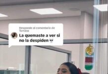 Joven exhibe a su compañera tomando cerveza en la oficina.